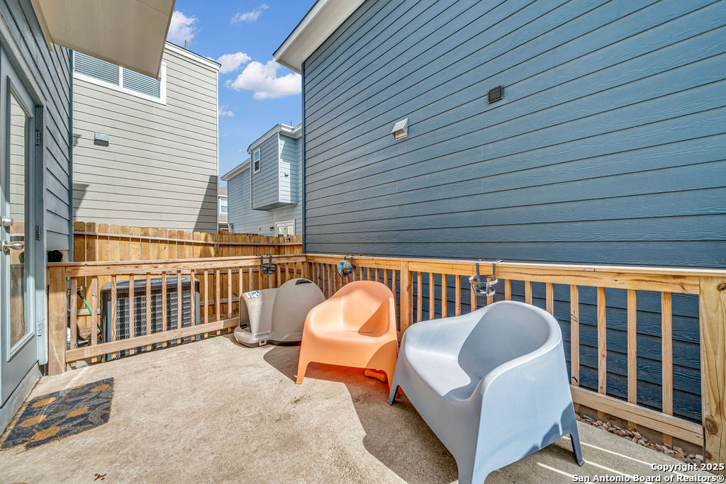 2045 Silver Oaks, Unit 18B San Antonio, TX 78213 - Photo 18 of 20 a view of a patio in a balcony