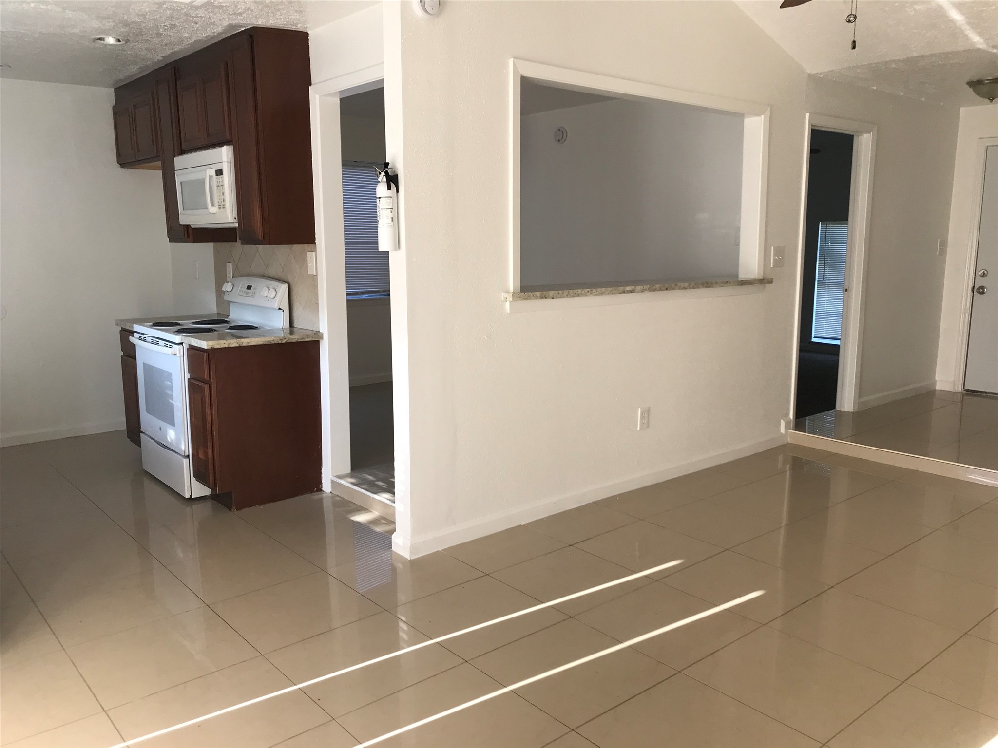 727 Doncrest Street Channelview, TX 77530 - Photo 12 of 40 a room with a door and a mirror