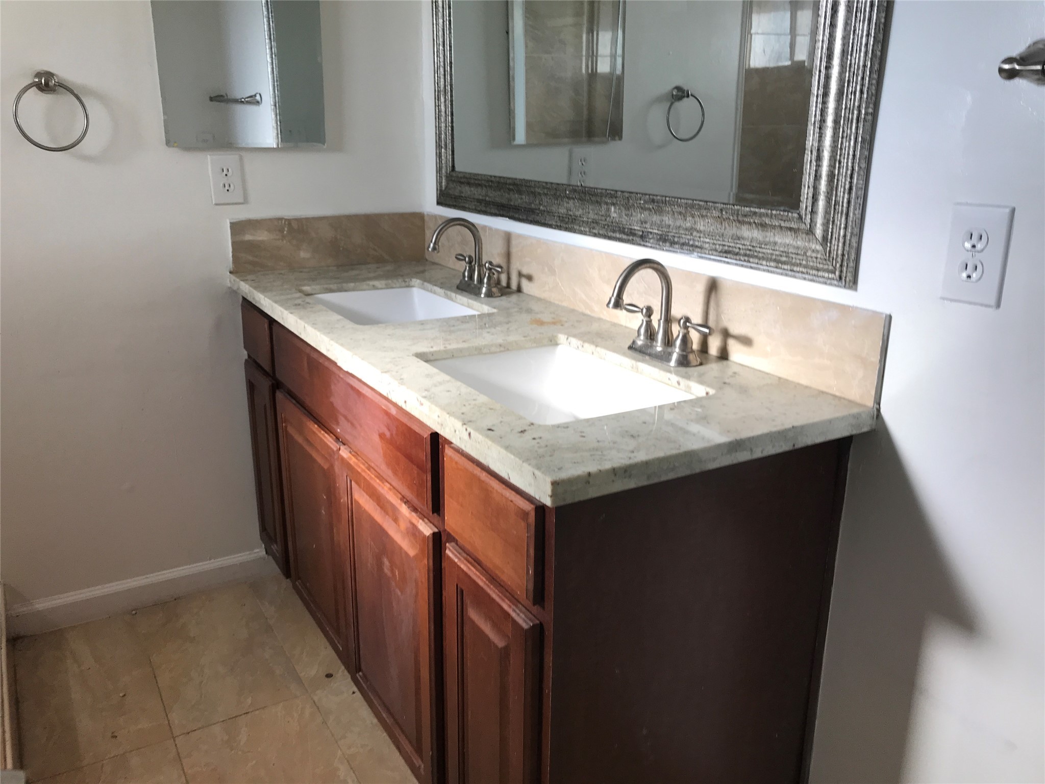 727 Doncrest Street Channelview, TX 77530 - Photo 21 of 40 a bathroom with a sink and a mirror