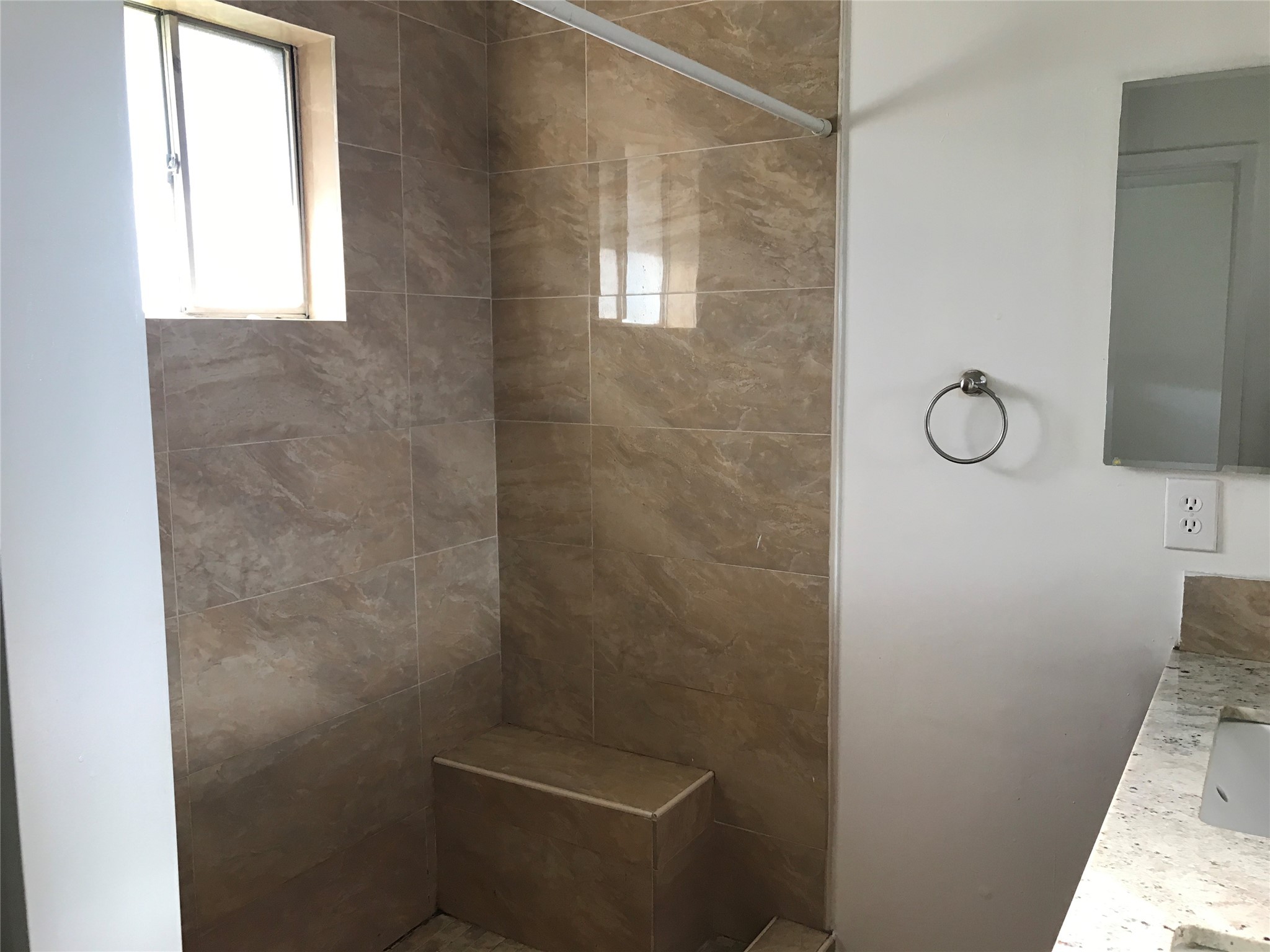 727 Doncrest Street Channelview, TX 77530 - Photo 24 of 40 a bathroom with a granite countertop toilet and a shower