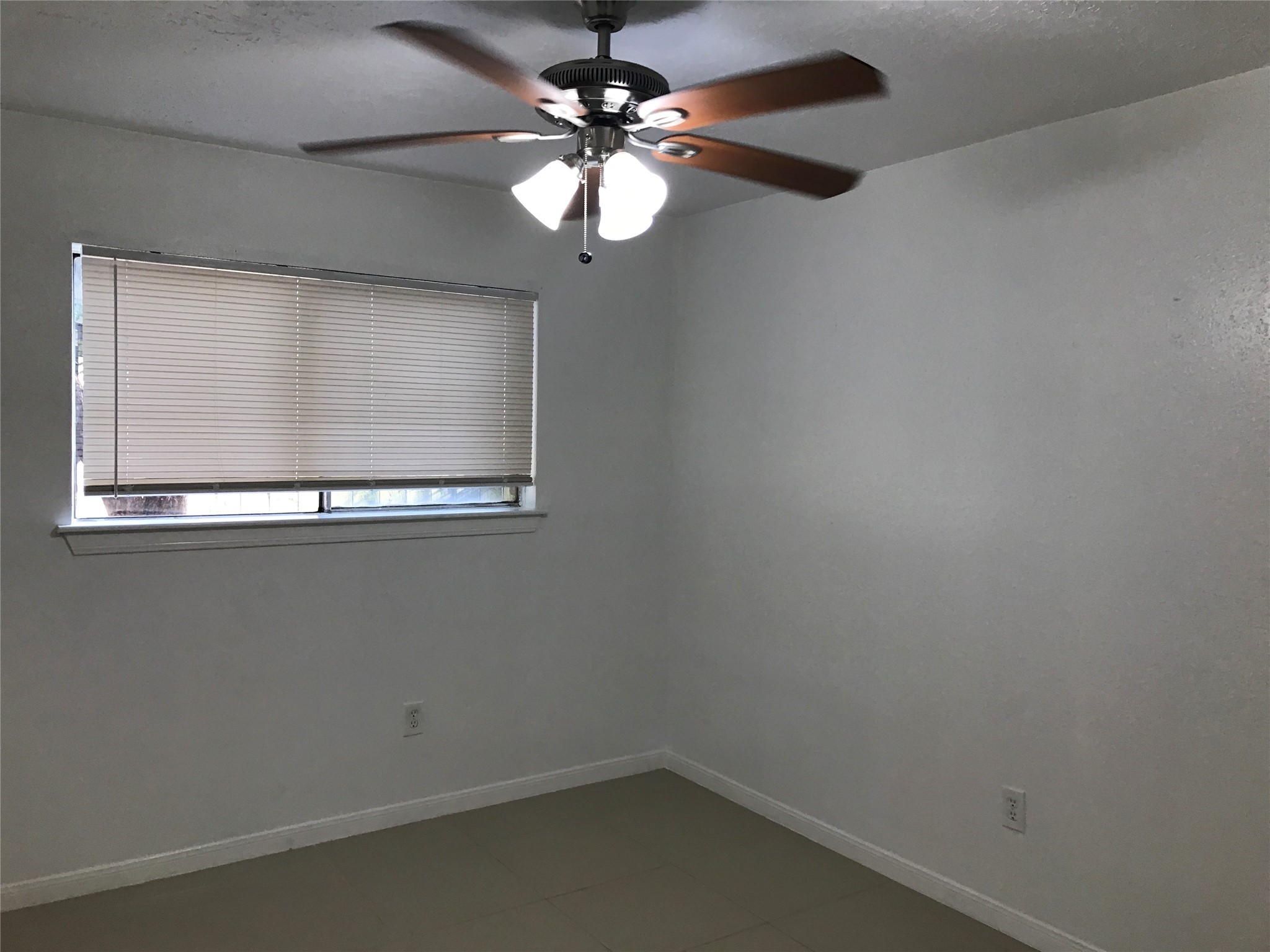 727 Doncrest Street Channelview, TX 77530 - Photo 38 of 40 a view of a small space with wooden floor and a window