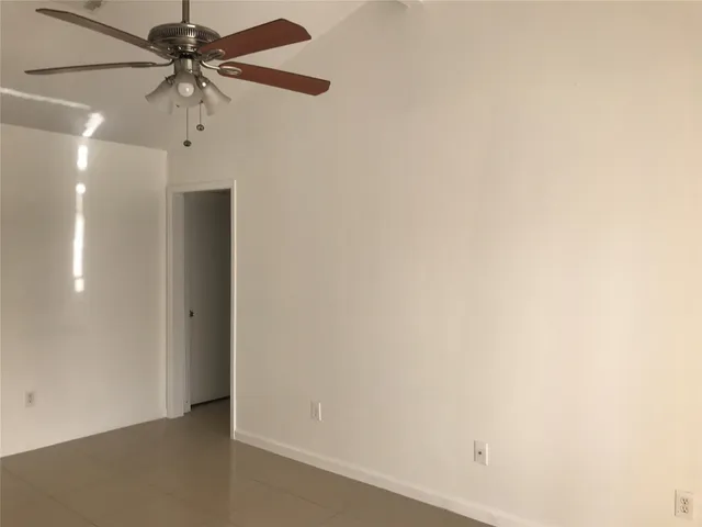a view of a room with a fan