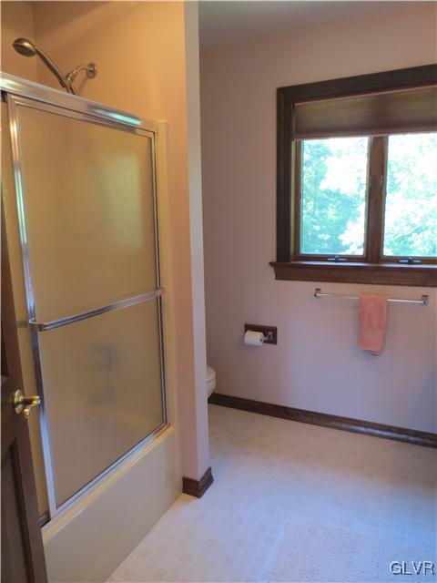 851 Bangor Road Nazareth, PA 18064 - Photo 32 of 49 a bathroom with a glass shower door