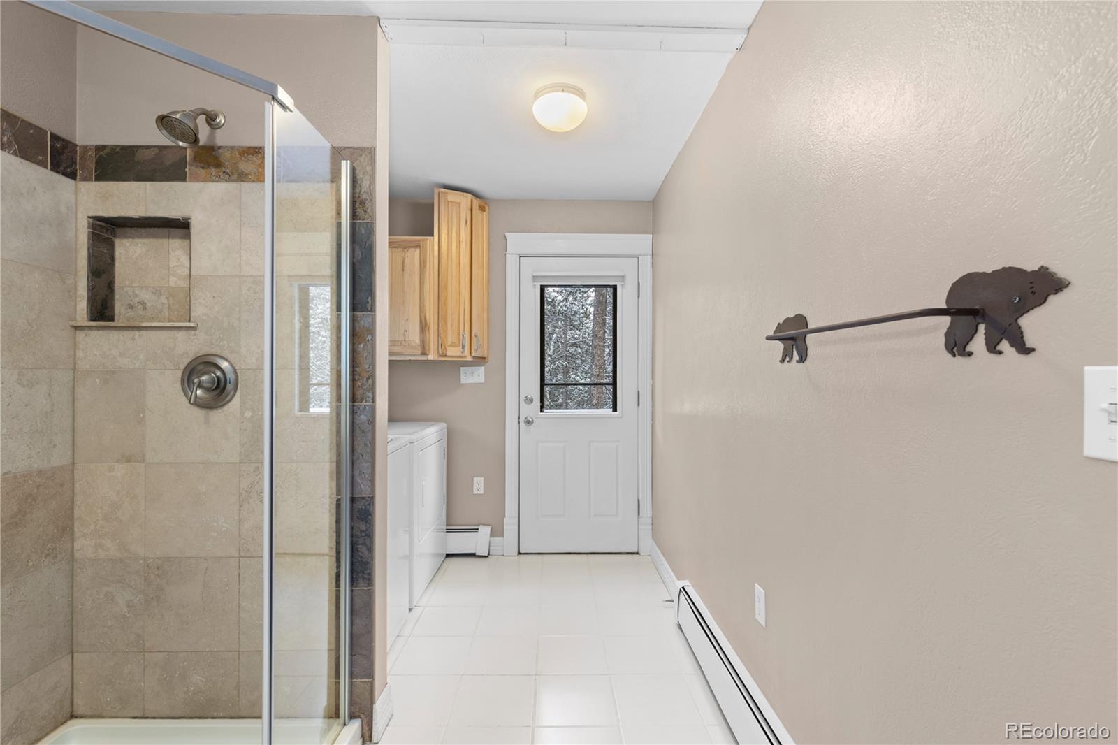 10684 Beas Drive Conifer, CO 80433 - Photo 18 of 38 a view of a bathroom from a hallway