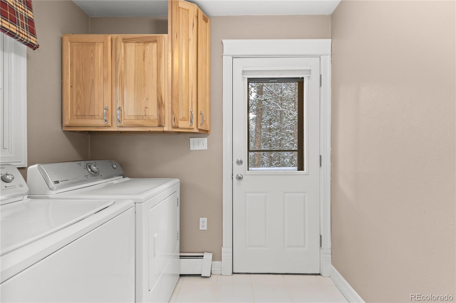 10684 Beas Drive Conifer, CO 80433 - Photo 19 of 38 a utility room with dryer and washer