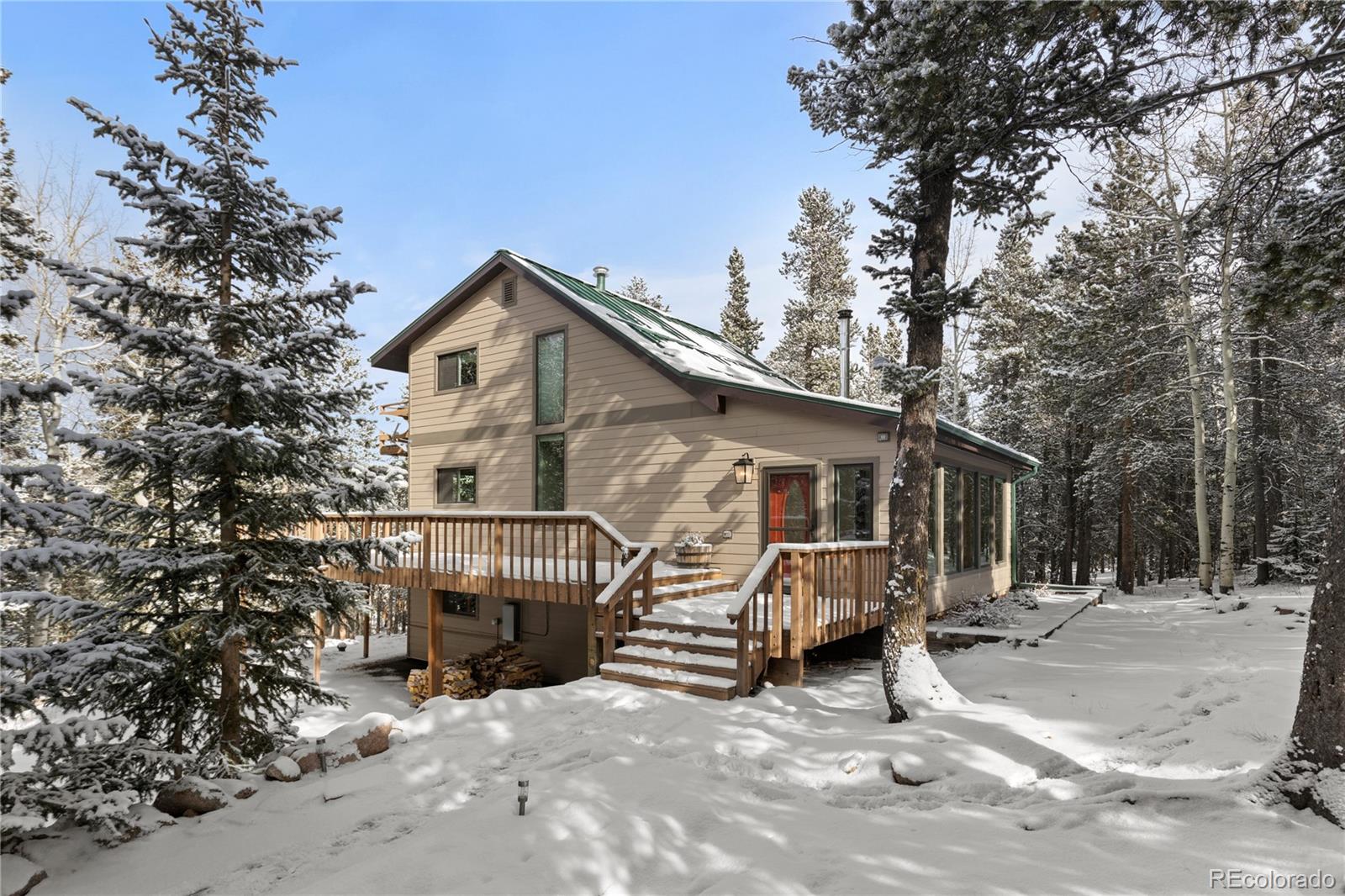 10684 Beas Drive Conifer, CO 80433 - Photo 31 of 38 a view of a house with a patio