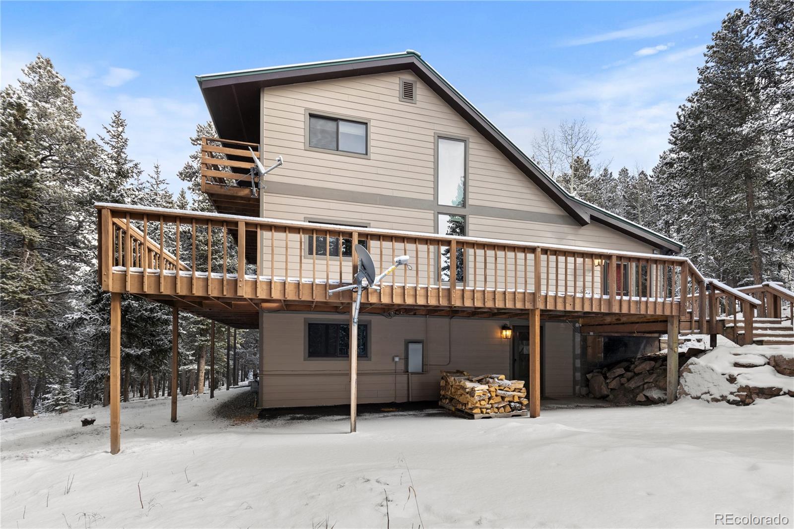 10684 Beas Drive Conifer, CO 80433 - Photo 33 of 38 a house view with a outdoor space
