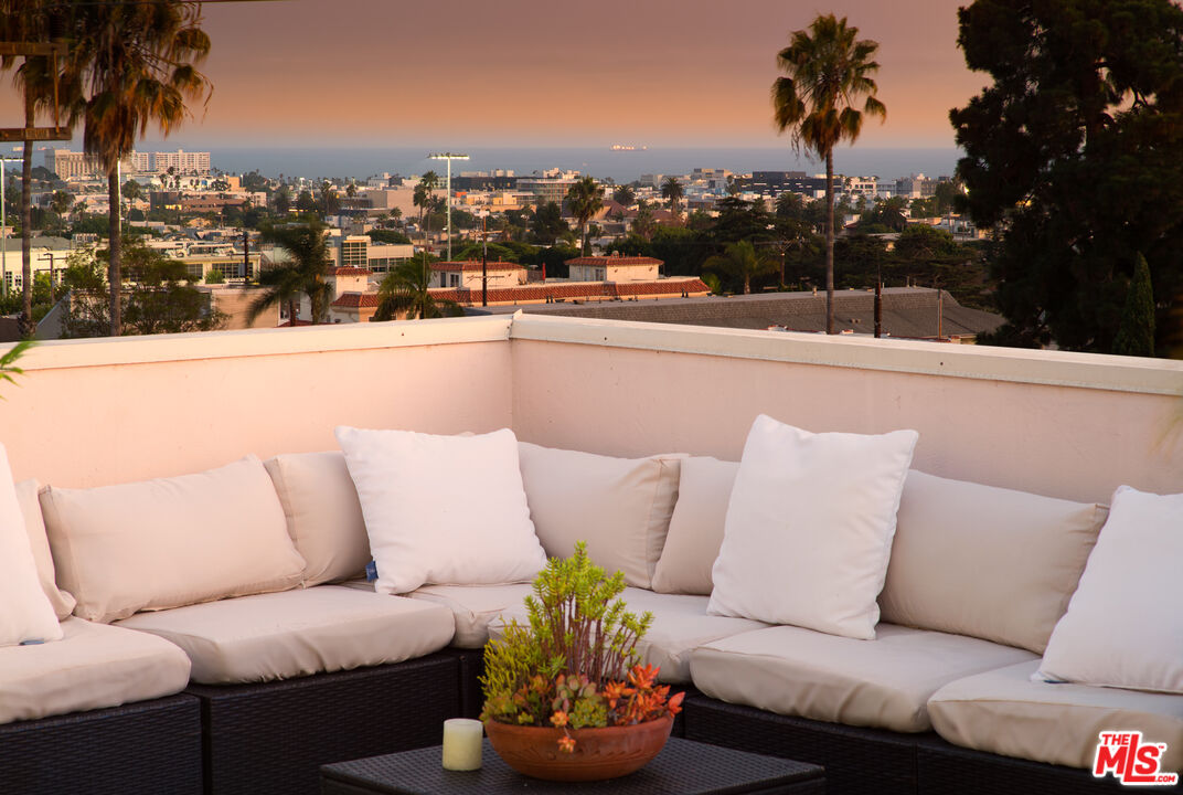 838 17th Street, Unit 105 Santa Monica, CA 90403 - Photo 2 of 10 a picture of a couch in a living room