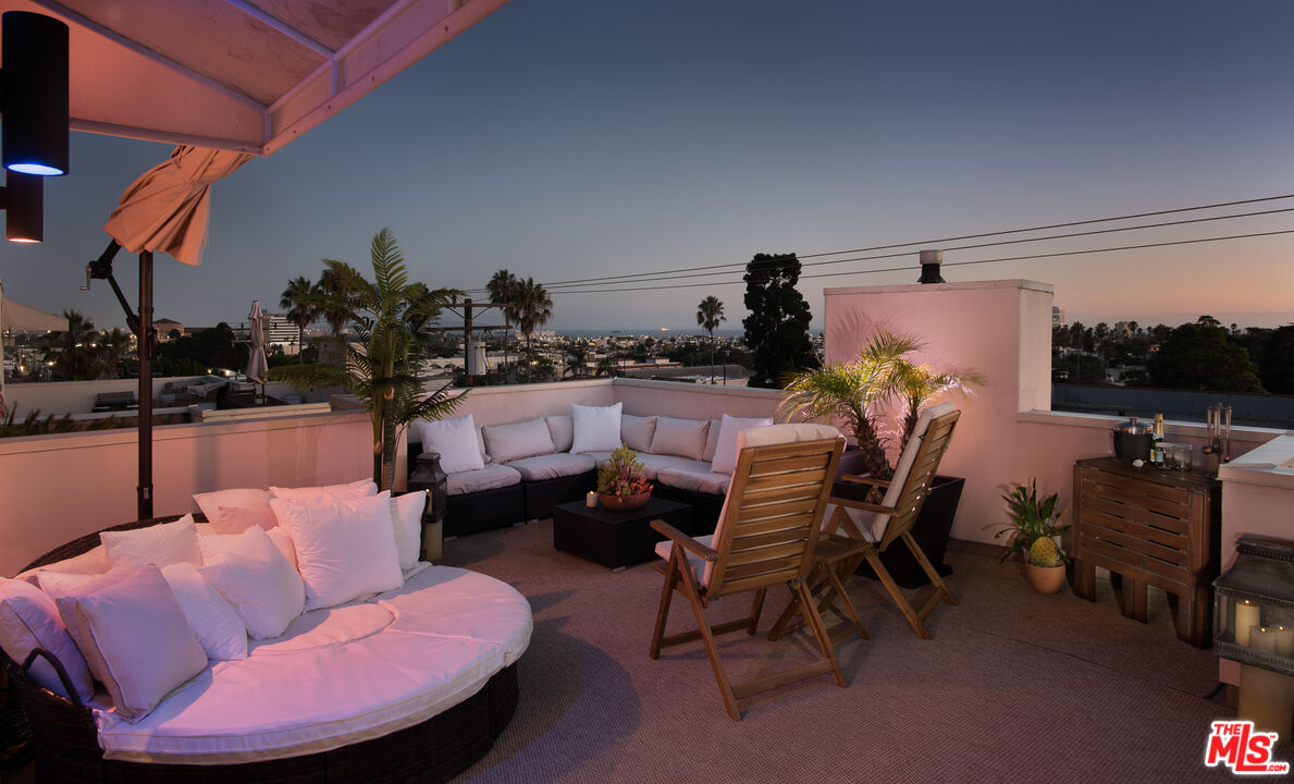 838 17th Street, Unit 105 Santa Monica, CA 90403 - Photo 6 of 10 a view of a livingroom with furniture