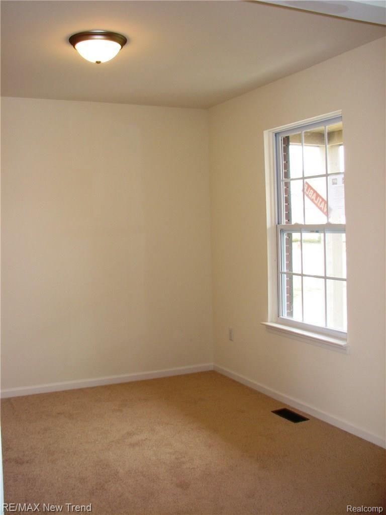 4048 Chase Ridge Lane Howell, MI 48843 - Photo 5 of 7 2nd bedroom.jpg