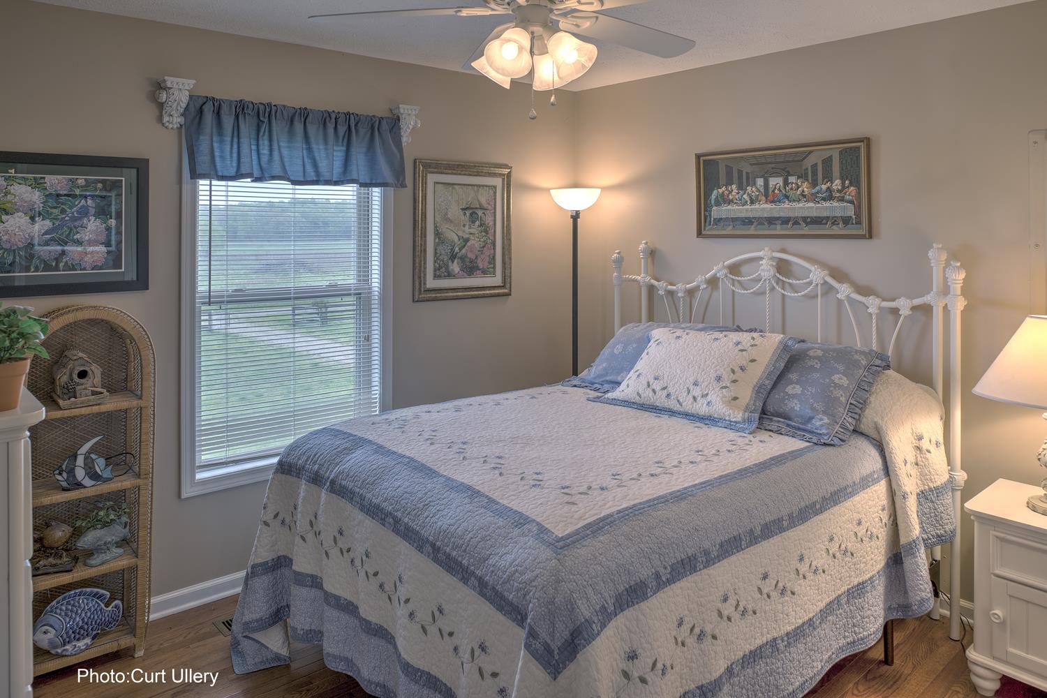 1385 Col James Hardin Road Clifton, TN 38425 - Photo 7 of 11 a bedroom with a bed and a window