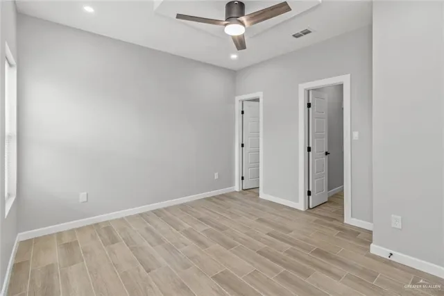 a view of kitchen and refrigerator