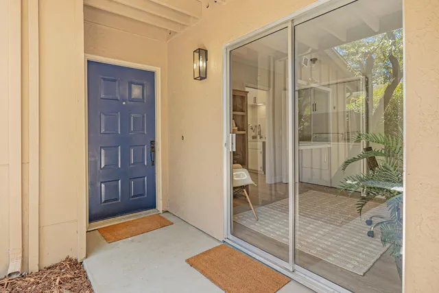 a bathroom with a shower and a sink