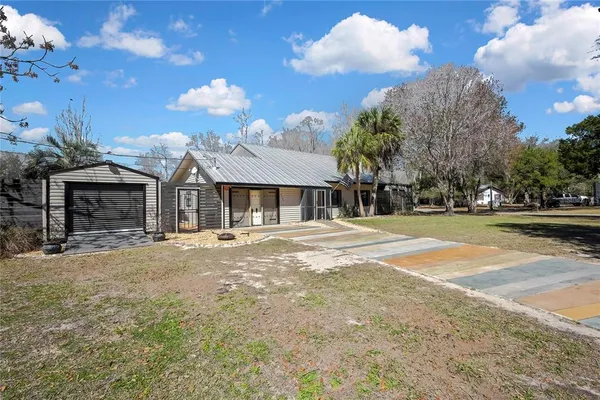 a view of a house with entertaining space
