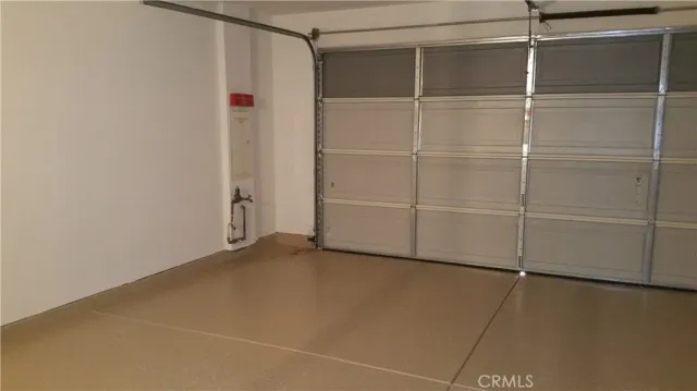 a front view of a brick house with a yard