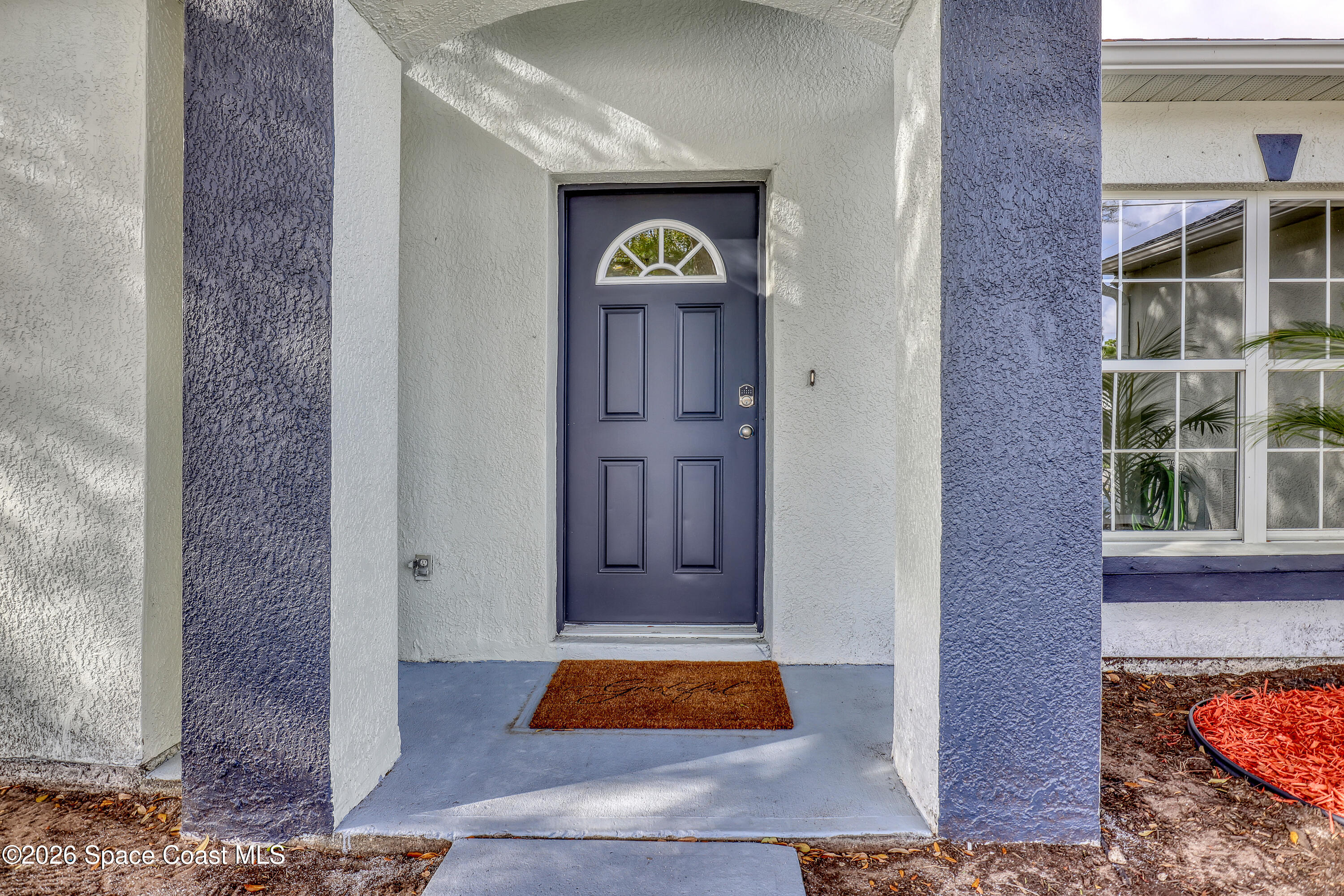 903 Raleigh Road Southeast Palm Bay, FL 32909 - Photo 2 of 30 Front Door