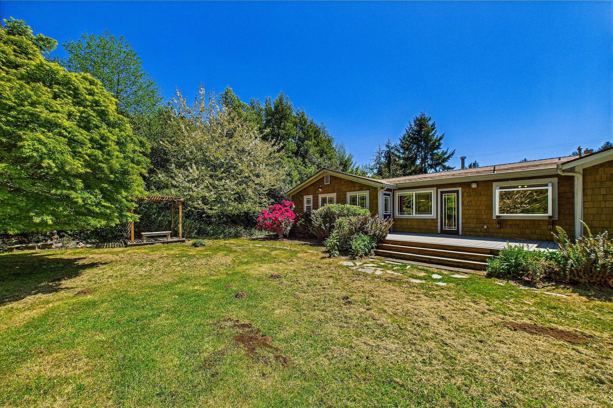 1945 Grange Road McKinleyville, CA 95519 - Photo 46 of 62 a front view of house with yard and green space