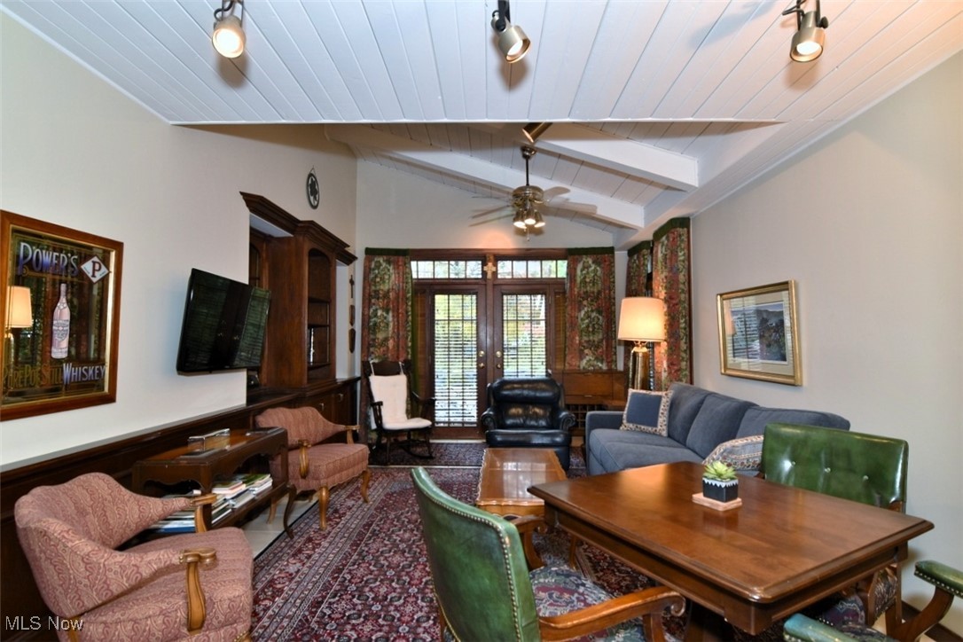 2315 Lalemant Road Cleveland, OH 44118 - Photo 6 of 23 Family room with beamed vaulted ceiling leading to patio.