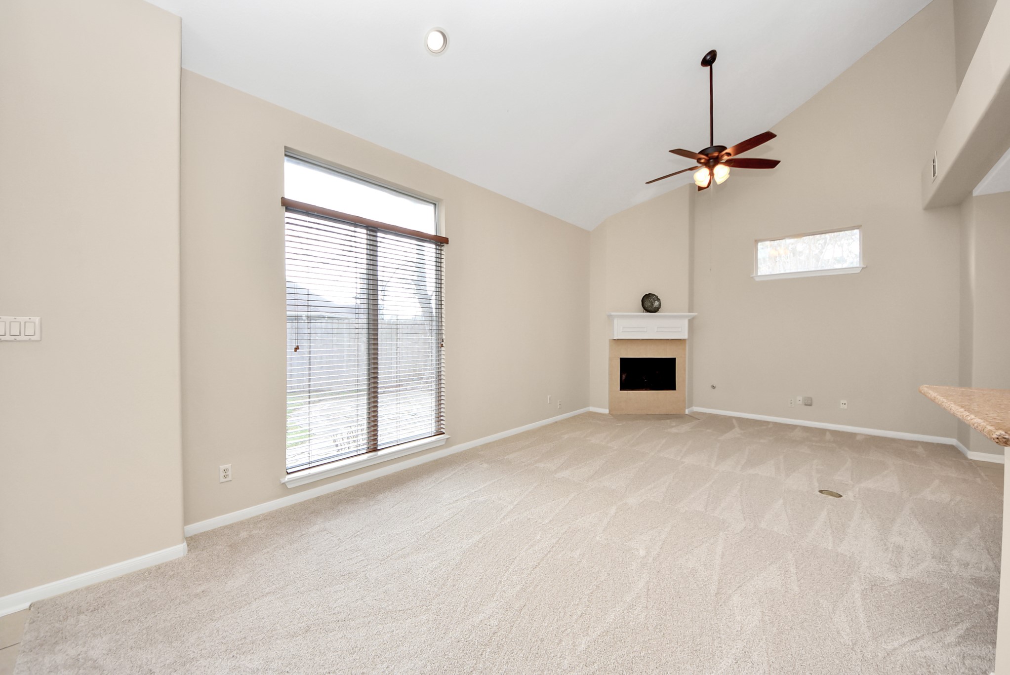 18963 Candlelight Crescent Road Spring, TX 77388 - Photo 9 of 33 An additional angle of the living room highlights the abundance of natural light.