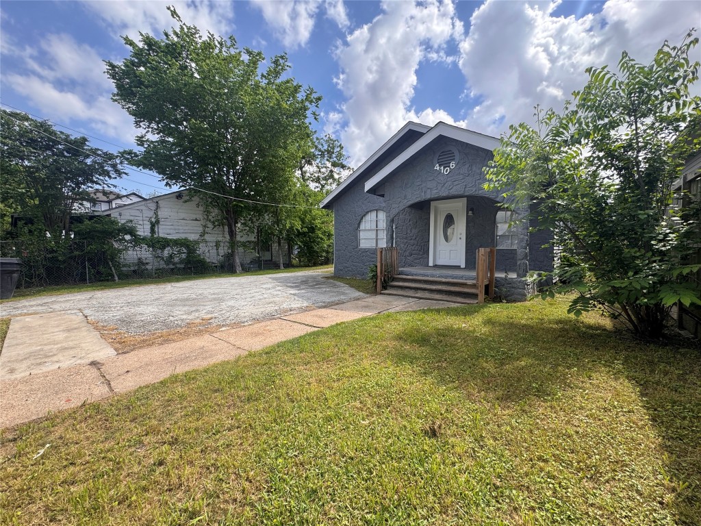 4106 Robertson Street Houston, TX 77009 - Photo 1 of 14 a house view with a garden space