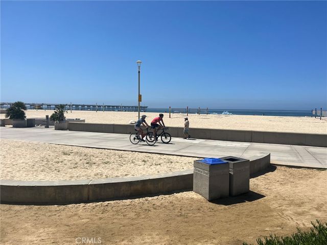 a view of a kitchen with wooden floor