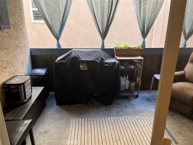 a living room with a couch and a large window