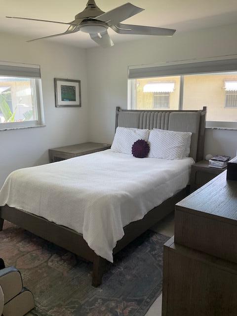 224 Cardinal Lane Delray Beach, FL 33445 - Photo 19 of 38 a bedroom with bed and a window