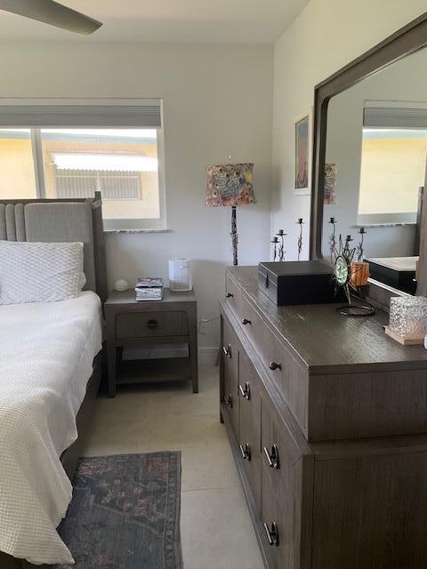 224 Cardinal Lane Delray Beach, FL 33445 - Photo 20 of 38 a spacious bathroom with a double vanity sink and a window