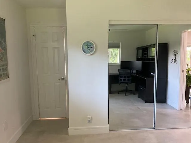 a bathroom with a sink toilet and mirror