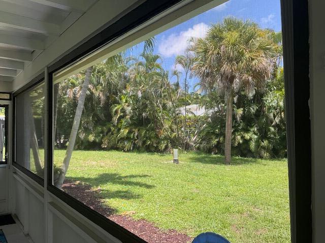224 Cardinal Lane Delray Beach, FL 33445 - Photo 33 of 38 a view of swimming pool from a window