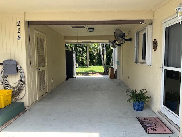224 Cardinal Lane Delray Beach, FL 33445 - Photo 36 of 38 a view of a entryway door of the house