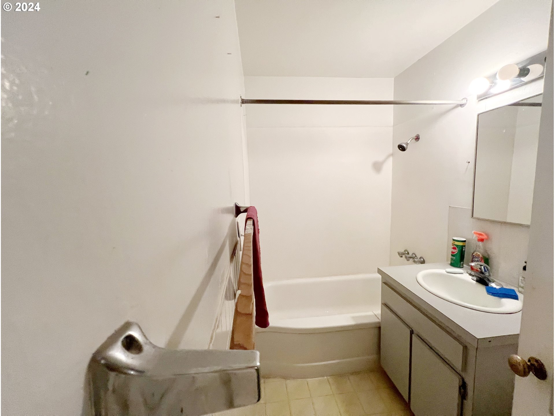 11535 Southeast Boise Street Portland, OR 97266 - Photo 8 of 10 a bathroom with a sink and a mirror