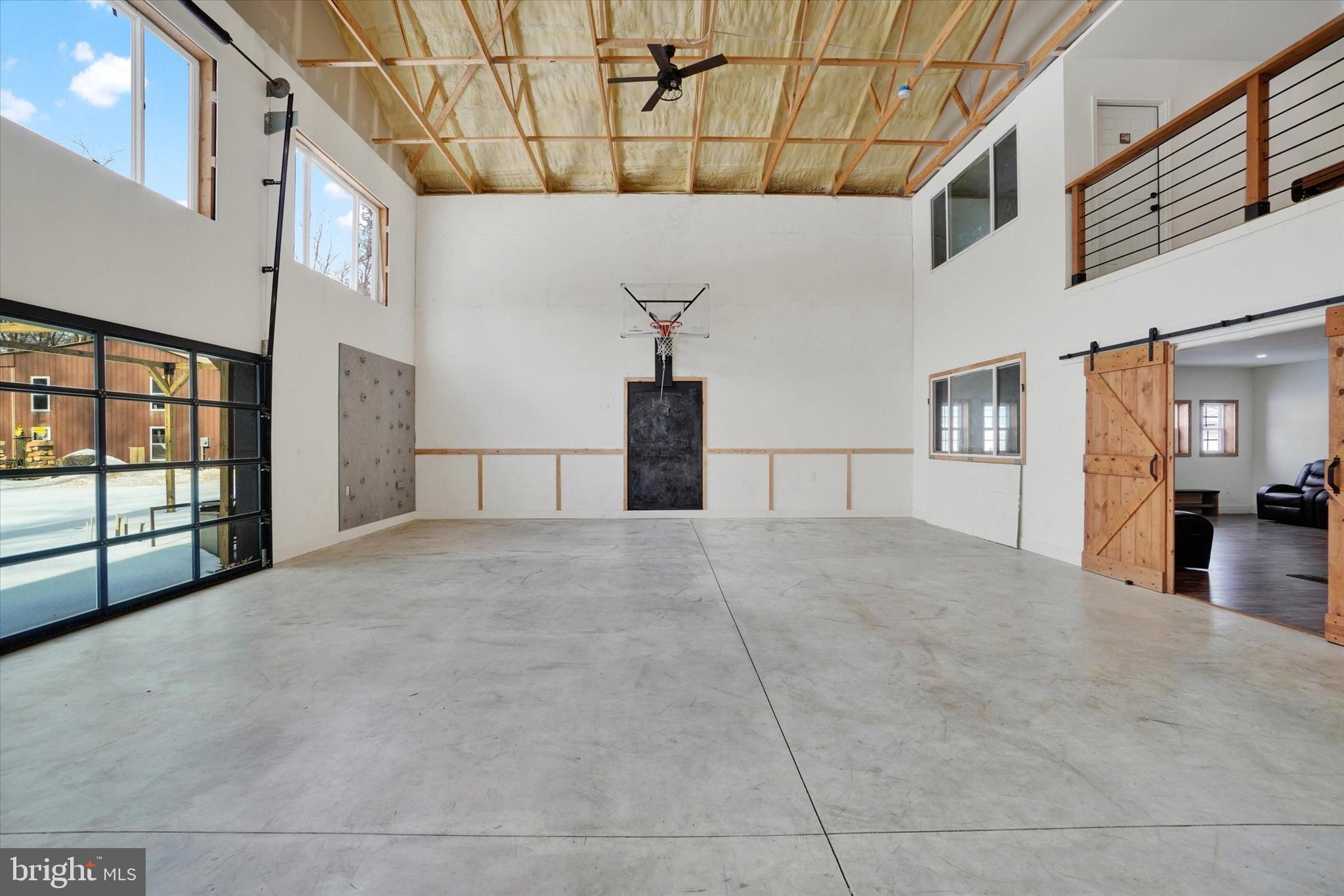 3828 Brownton Road Felton, PA 17322 - Photo 15 of 48 Indoor basketball area and climbing wall