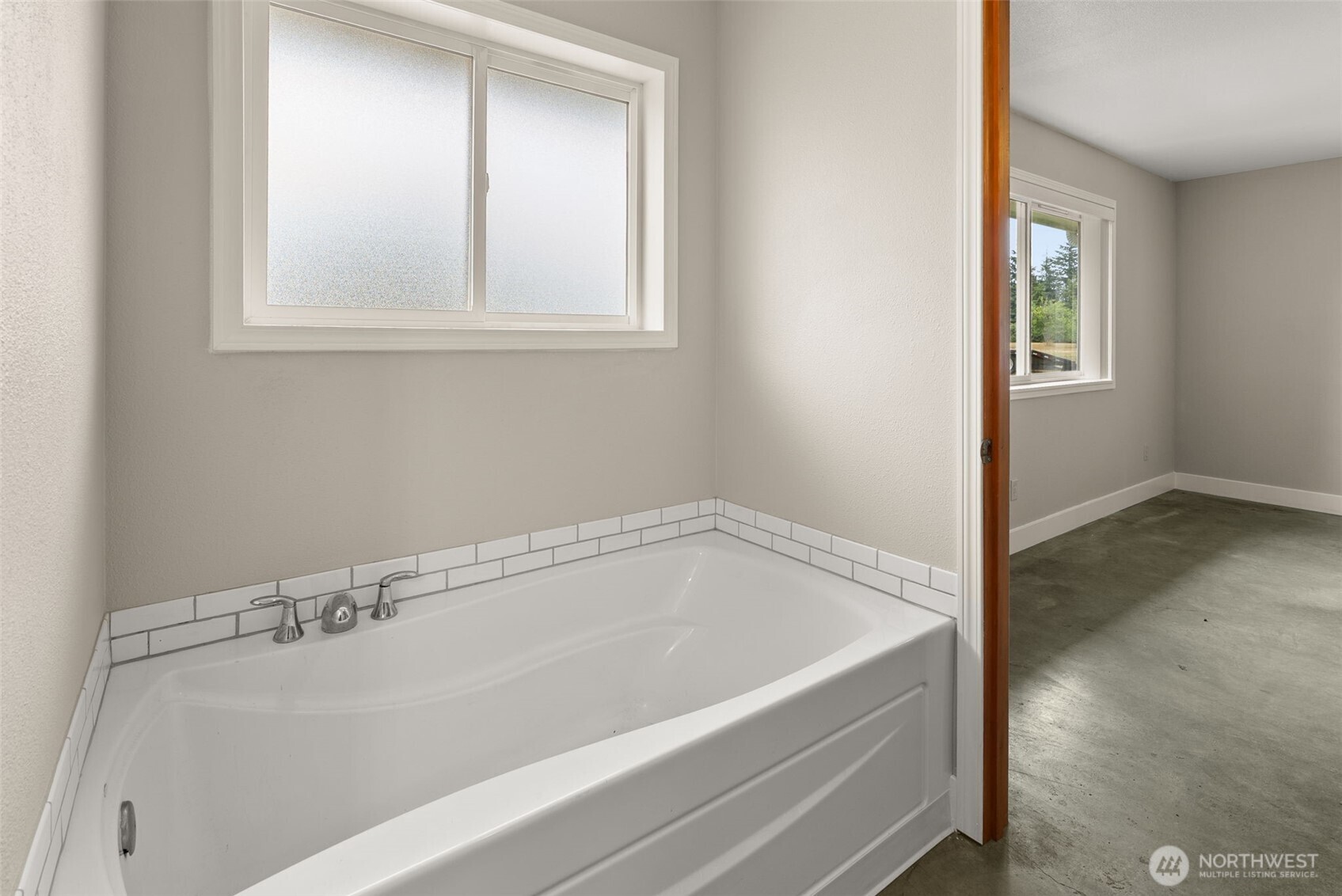 33 Rustemeyer Road Aberdeen, WA 98520 - Photo 22 of 39 a white bath tub sitting in a bathroom