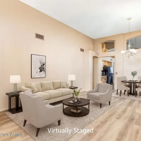 a living room with furniture and a couch