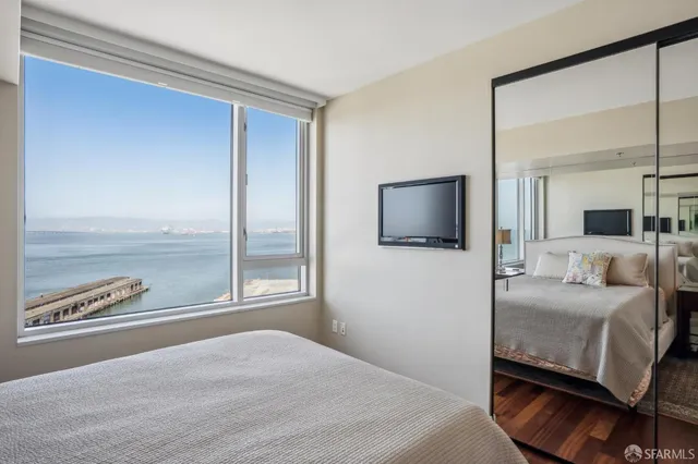 a kitchen with a stove sink and cabinets