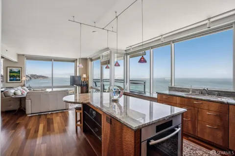 a view of a swimming pool with a lounge chair