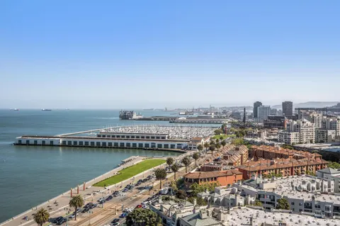 a very nice looking dining room with a table and chairs