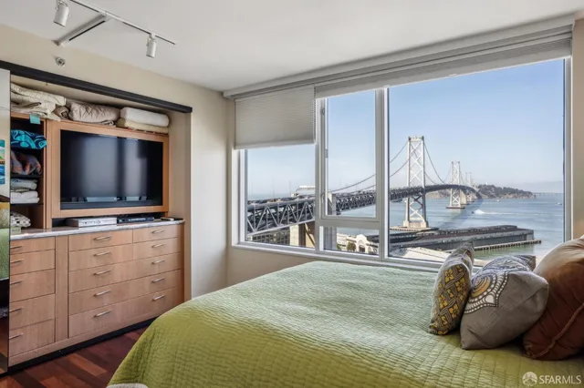 a kitchen with stainless steel appliances granite countertop a sink and a wooden cabinets