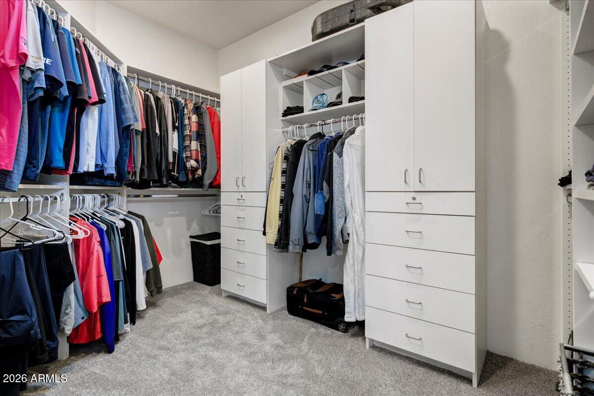 27901 Tranquilo Way Rio Verde, AZ 85263 - Photo 15 of 35 a view of walk in closet with clothes