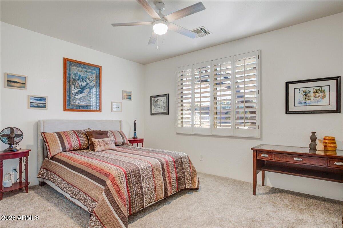 27901 Tranquilo Way Rio Verde, AZ 85263 - Photo 16 of 35 a bedroom with a bed and a window