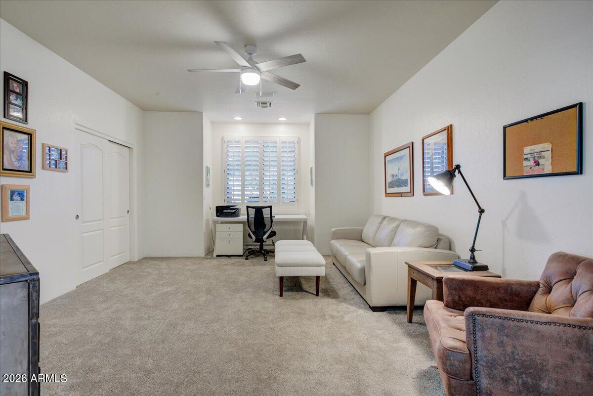 27901 Tranquilo Way Rio Verde, AZ 85263 - Photo 19 of 35 a living room with furniture and a window