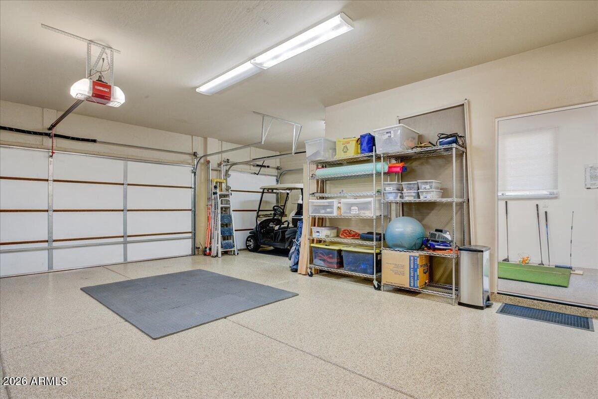 27901 Tranquilo Way Rio Verde, AZ 85263 - Photo 21 of 35 a view of a room with racks on the wall