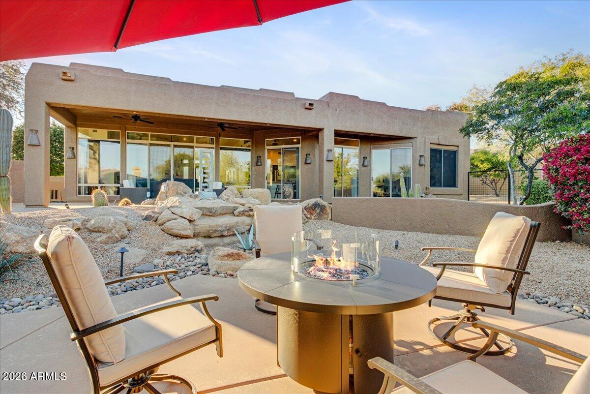 27901 Tranquilo Way Rio Verde, AZ 85263 - Photo 26 of 35 a view of a dining room with furniture window and outside view