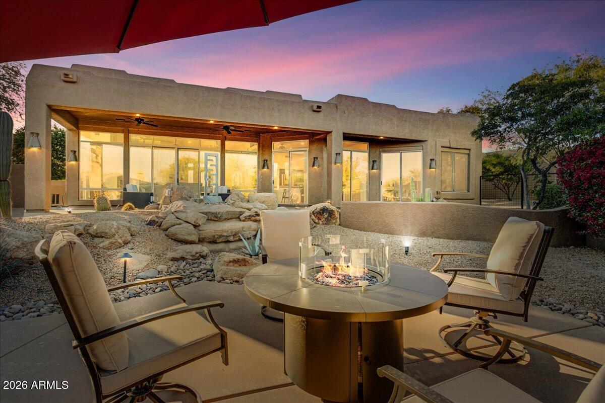 27901 Tranquilo Way Rio Verde, AZ 85263 - Photo 30 of 35 a view of a dining room with furniture and chandelier