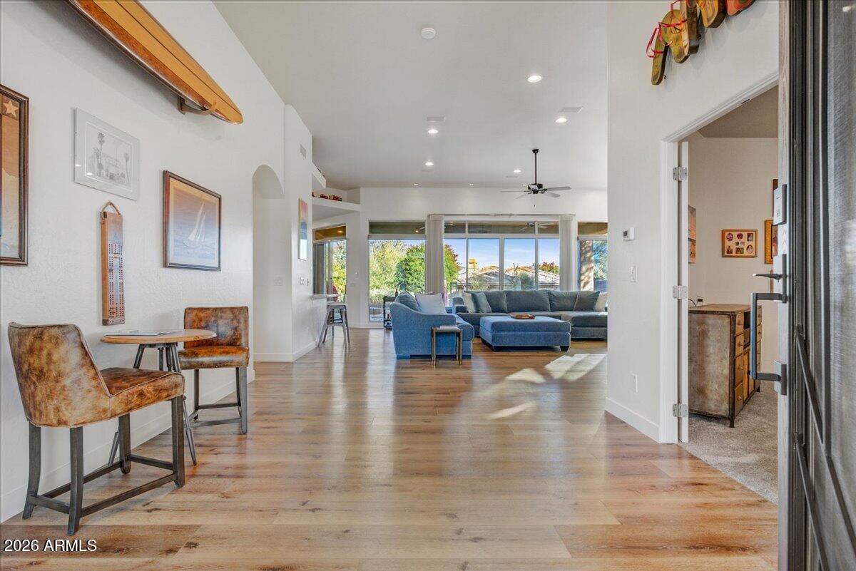 27901 Tranquilo Way Rio Verde, AZ 85263 - Photo 5 of 35 a living room with furniture and wooden floor
