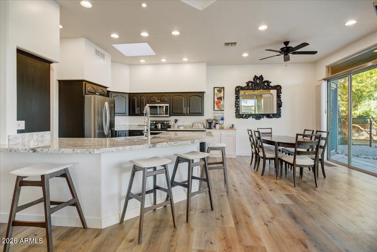 27901 Tranquilo Way Rio Verde, AZ 85263 - Photo 9 of 35 a large kitchen with a table and chairs