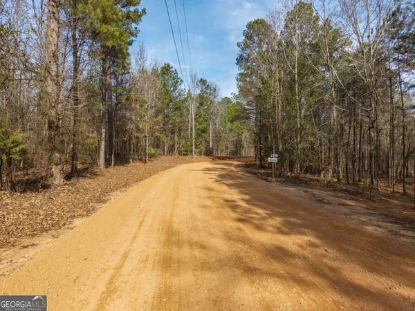a view of road with trees