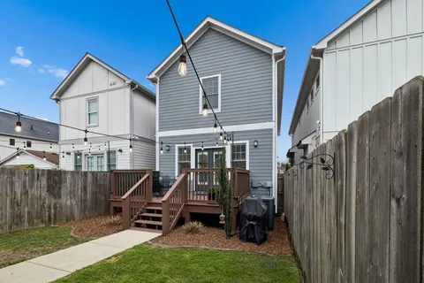 a front view of a house with garage