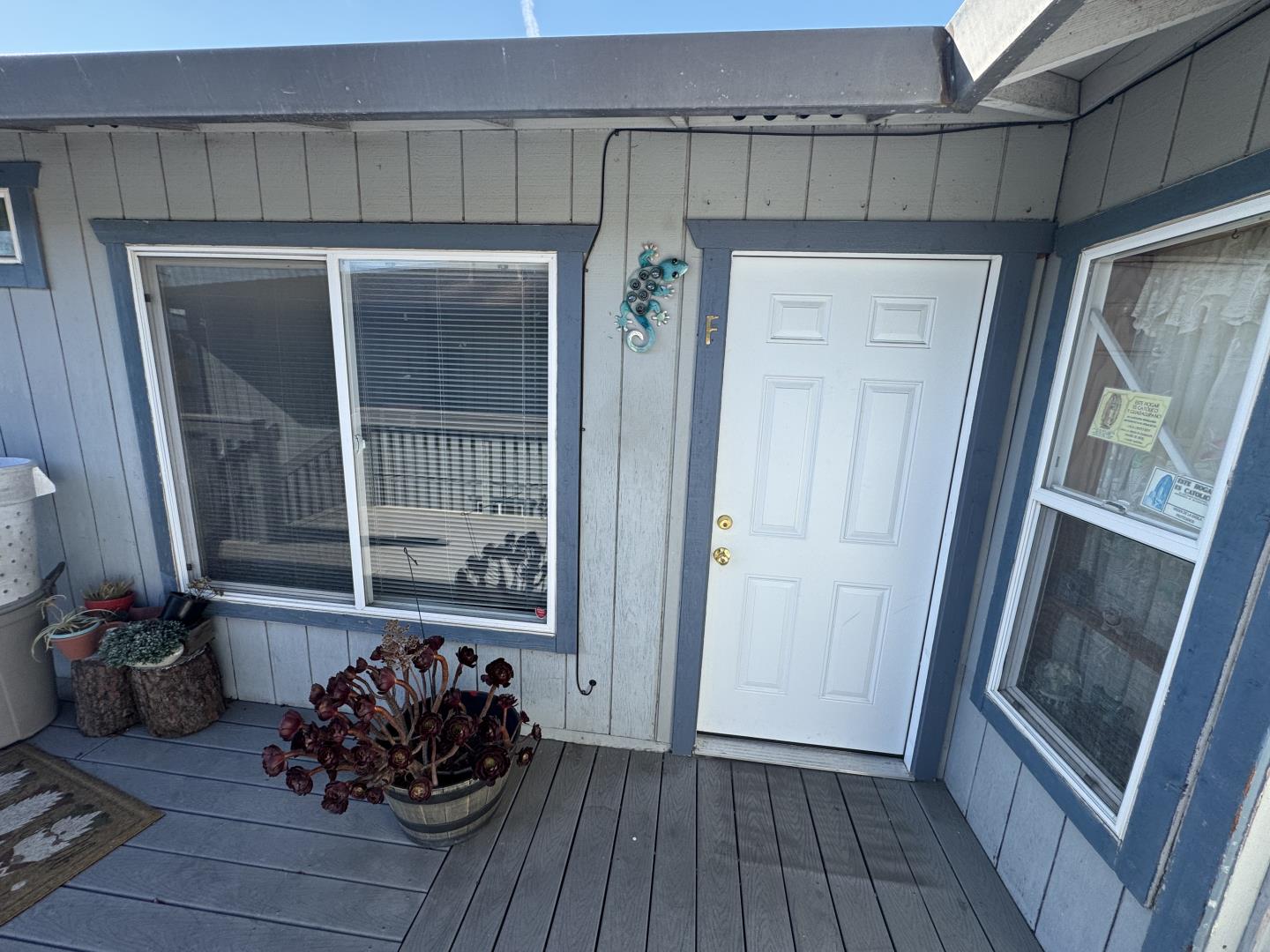 a room with wooden floor and furniture